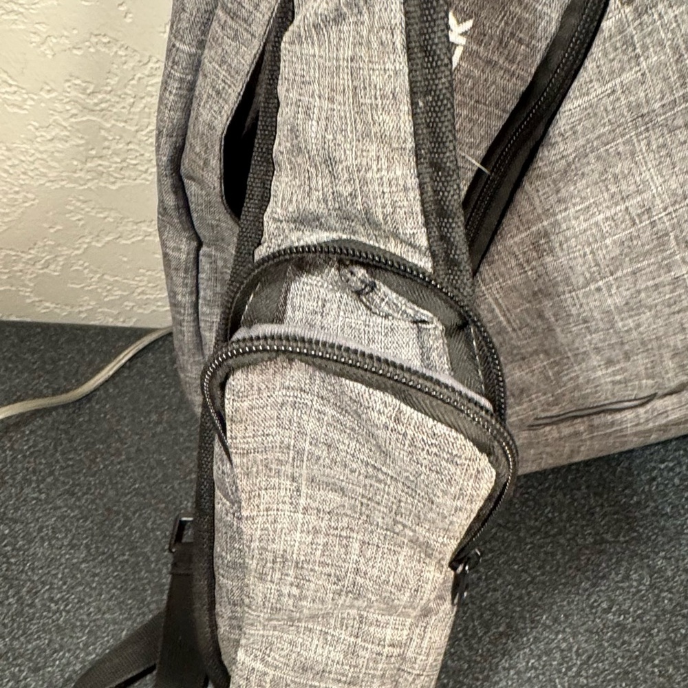 Modern Gray and Black Backpack with Adjustable Straps - Picture 4 of 10